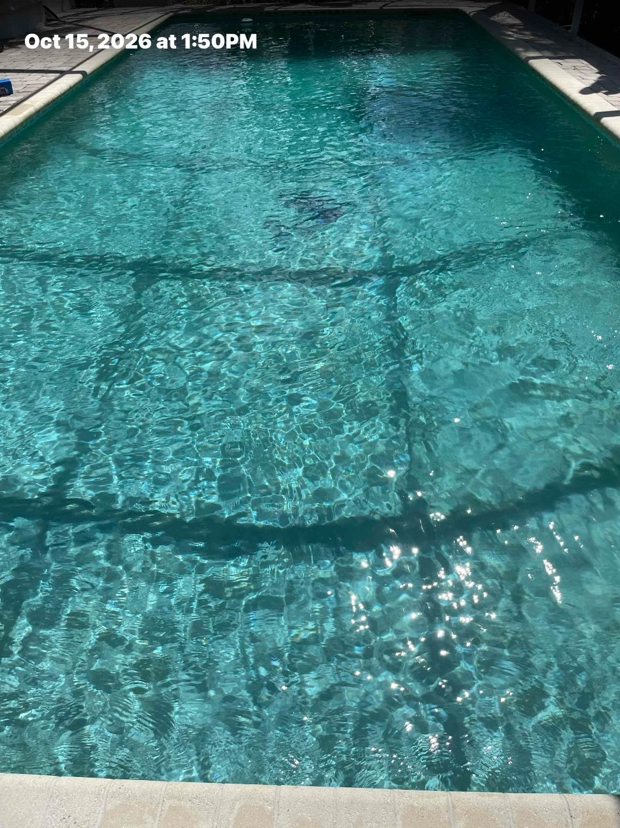 After: the same pool with clear blue water
